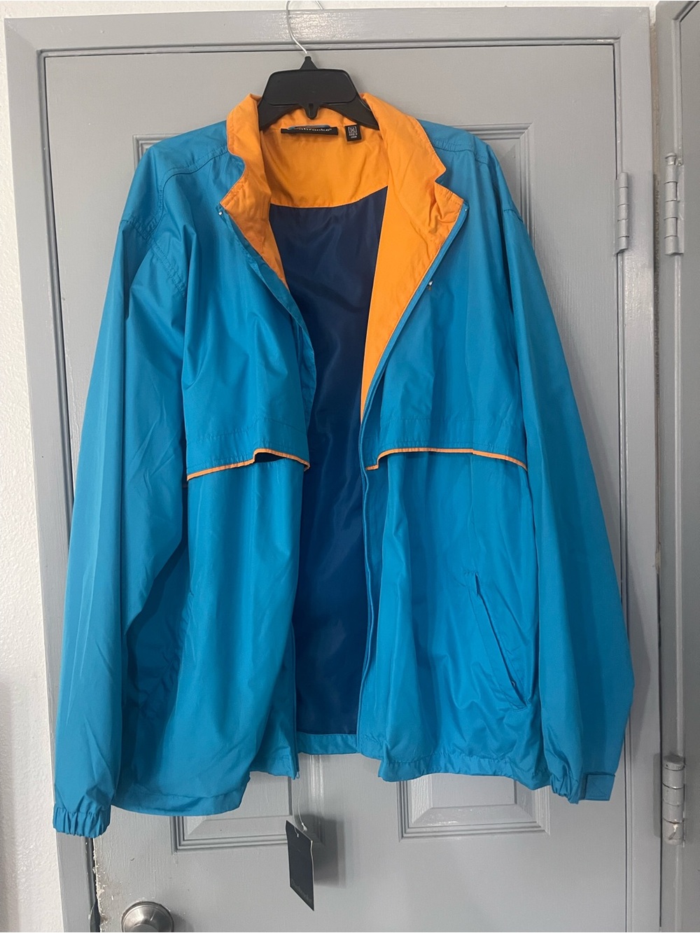 Dunbrooke Bright Teal Windbreaker with Orange Lining